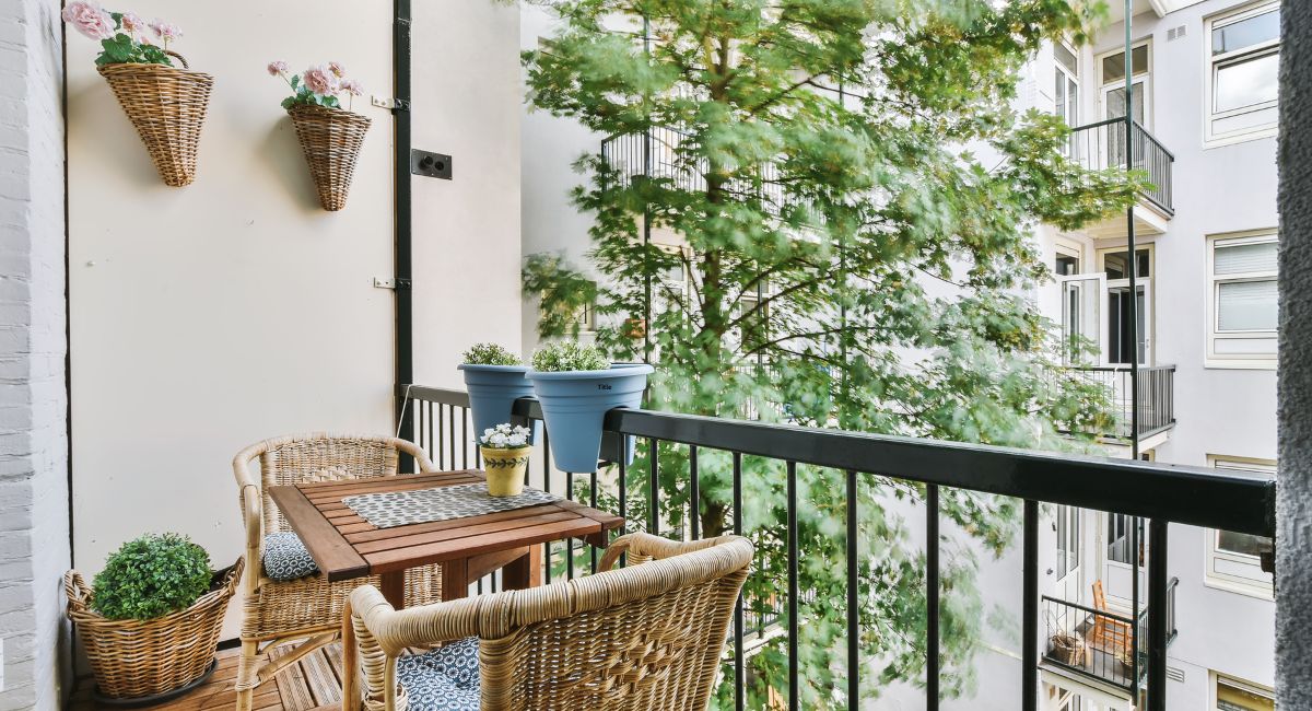 Small Balcony Design with Table and Chairs